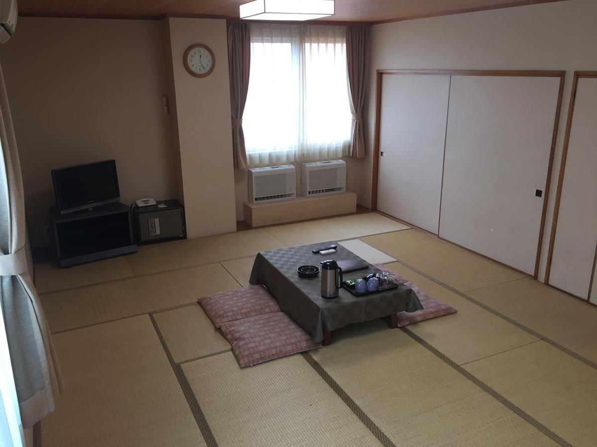 Kitamura Onsen Hotel Iwamizawa Экстерьер фото